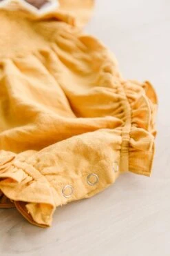 Baby Lennon Romper In Mustard -Fashion Clothing Store LennonMustard Studio SS23 2 0e78e8b7 ef25 4dc7 874f 7f84fa5244ba